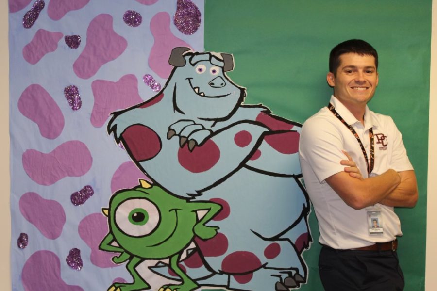 Mike Wazowski, Sulley, and Mr. Jablonka pose side-by-side, smiling from horn-to-horn. Like Sulley leaning on Mike, Mr. Jablonka plans on getting some help from his own students to make SGA its best year yet.