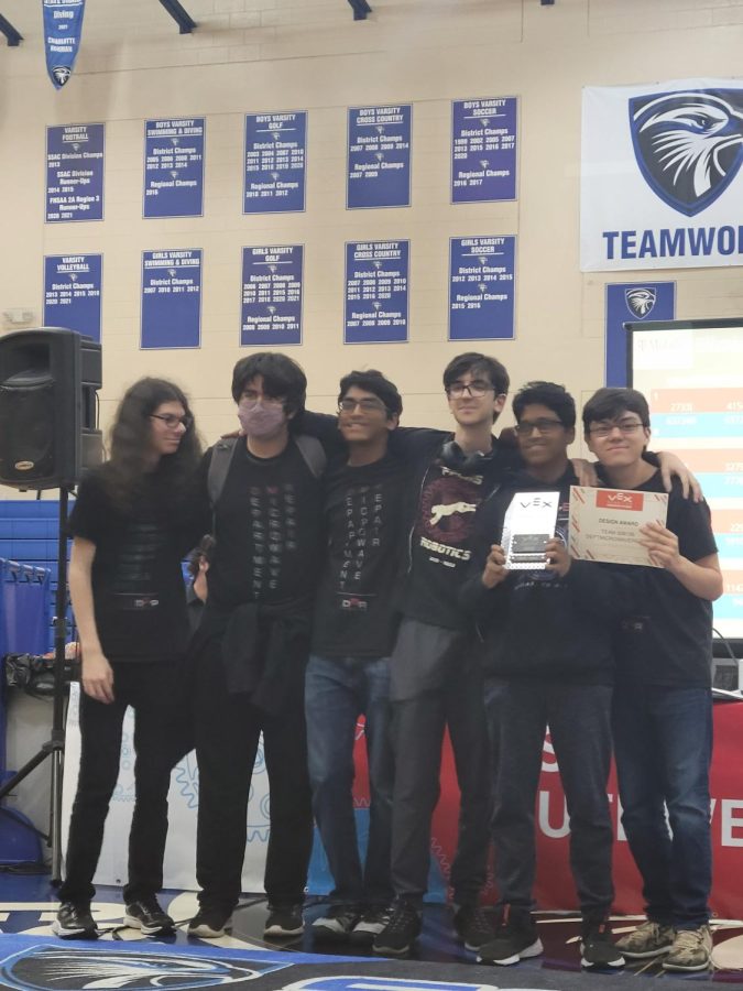 With arms wrapped around each other’s shoulders, the PPCHS’s Robotics pose with their certificates of robotic excellence after competing at the VEX competition. Currently #16 in the world in the skills category, the team looks to keep improving so that they can become world finalists. 