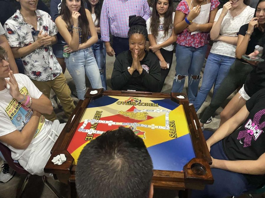 Surrounded by anxious students, assistant principal, Ms. Battle, hopes and prays her teammate plays the right piece. Spanish Honor Society’s Domino Night had students on their toes with its exciting competition, so much that it might make a return later this year.