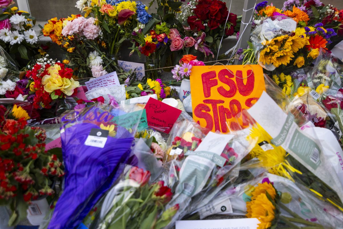 Flowers and candles placed across the Florida State University campus in memorial on Friday April 18, 2025. Photo by Matthew McConnell/Florida State University