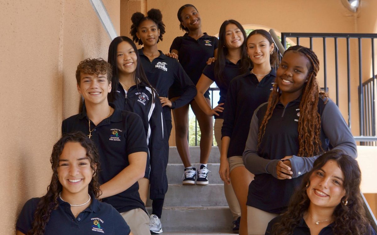 The Student Athlete Association (SAA) board, smiling at the camera. 