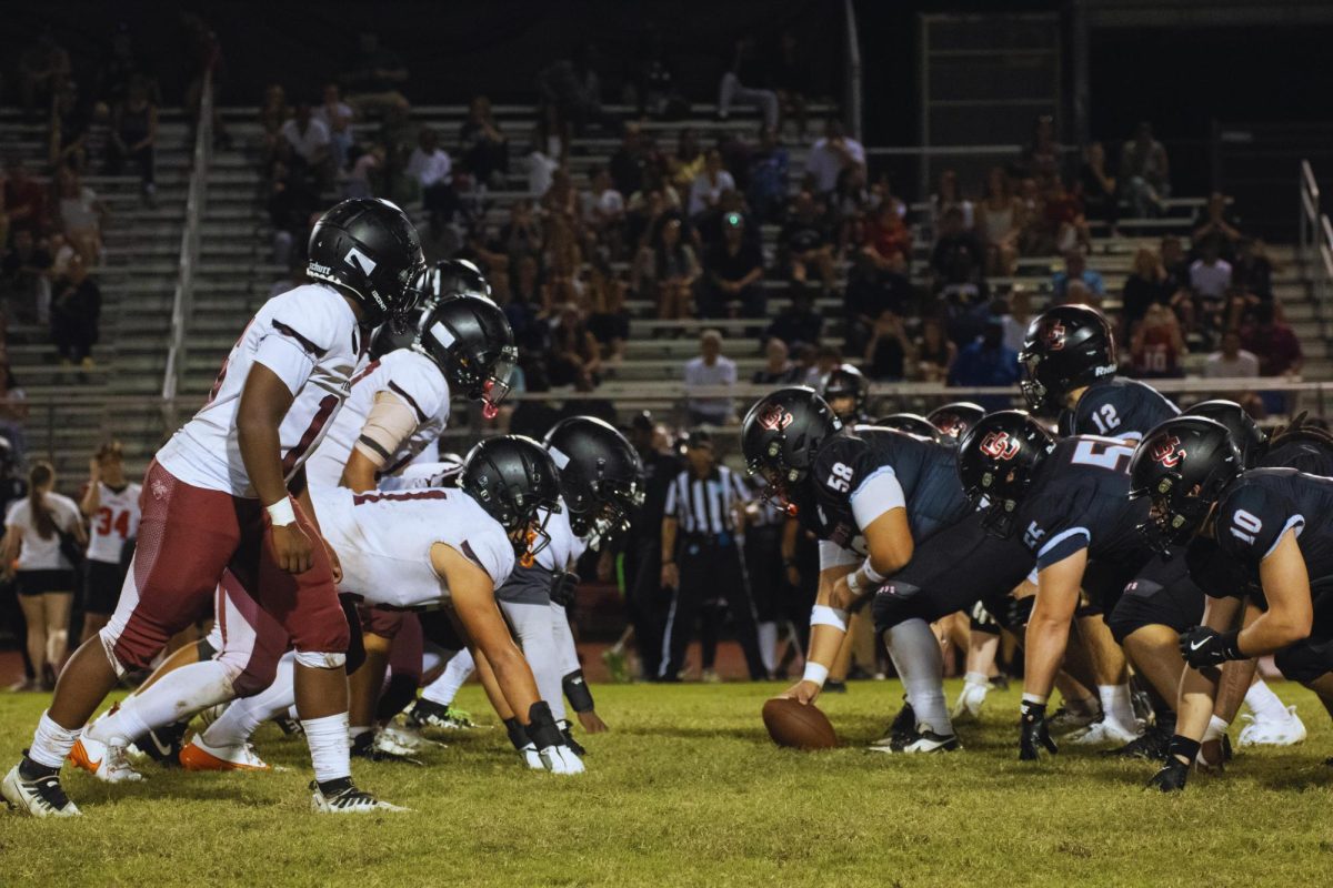 The Jaguar's football defense getting ready to stop the opposing team's [Cooper City High School] offensive drive.