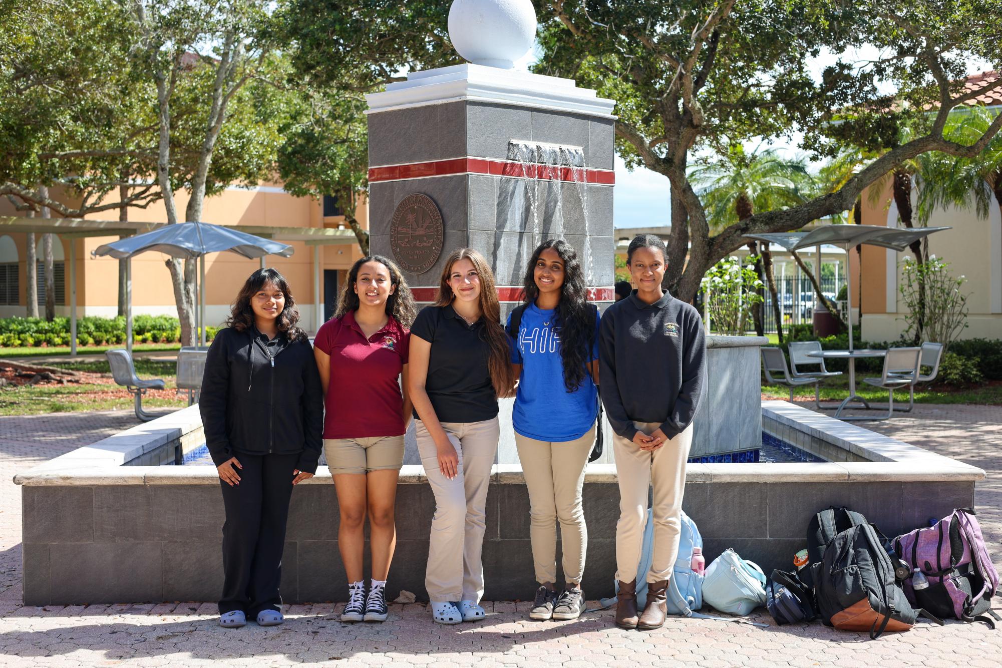 The board of the restarted Girls Who Code club at PPCHS poses for a photo by the school fountain. From left: junior and Historian Sarah Pervez, junior and Secretary Sophia Degand, sophomore and Co-President Alyssa Gomez, Co-President Ashna Zacharias, and junior and Treasurer Mikayla Hines.