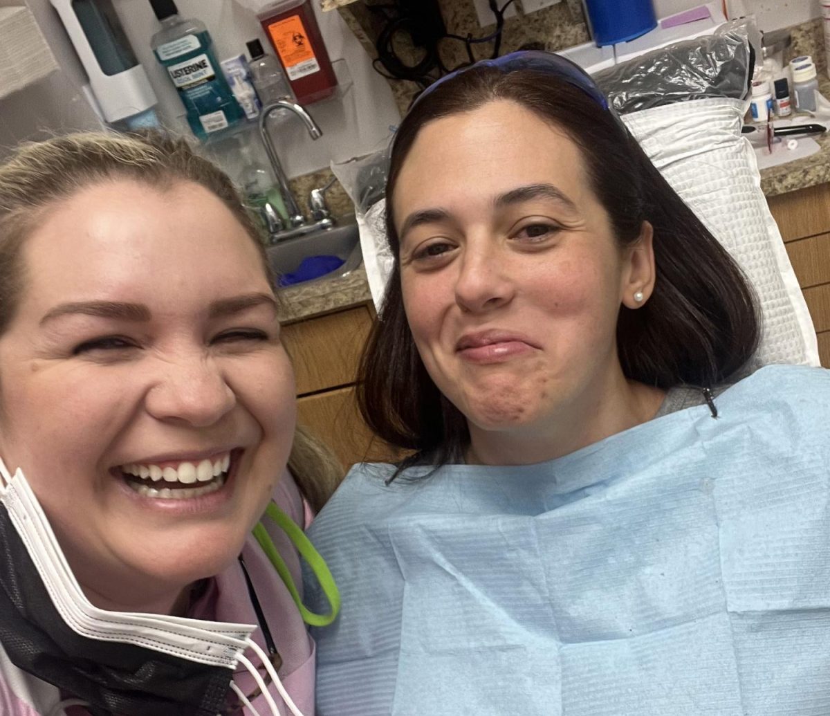 Leilani Lorenzo (pictured left) shares a laugh with a patient (pictured right) during an appointment.