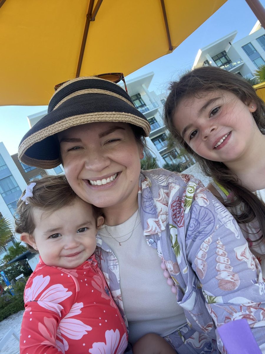 Photo_2__Lana_(pictured_left)_sits_with_Leilani_Lorenzo_(pictured_center)_and_Mila_(pictured_right)_during_a_sunny_pool_day.