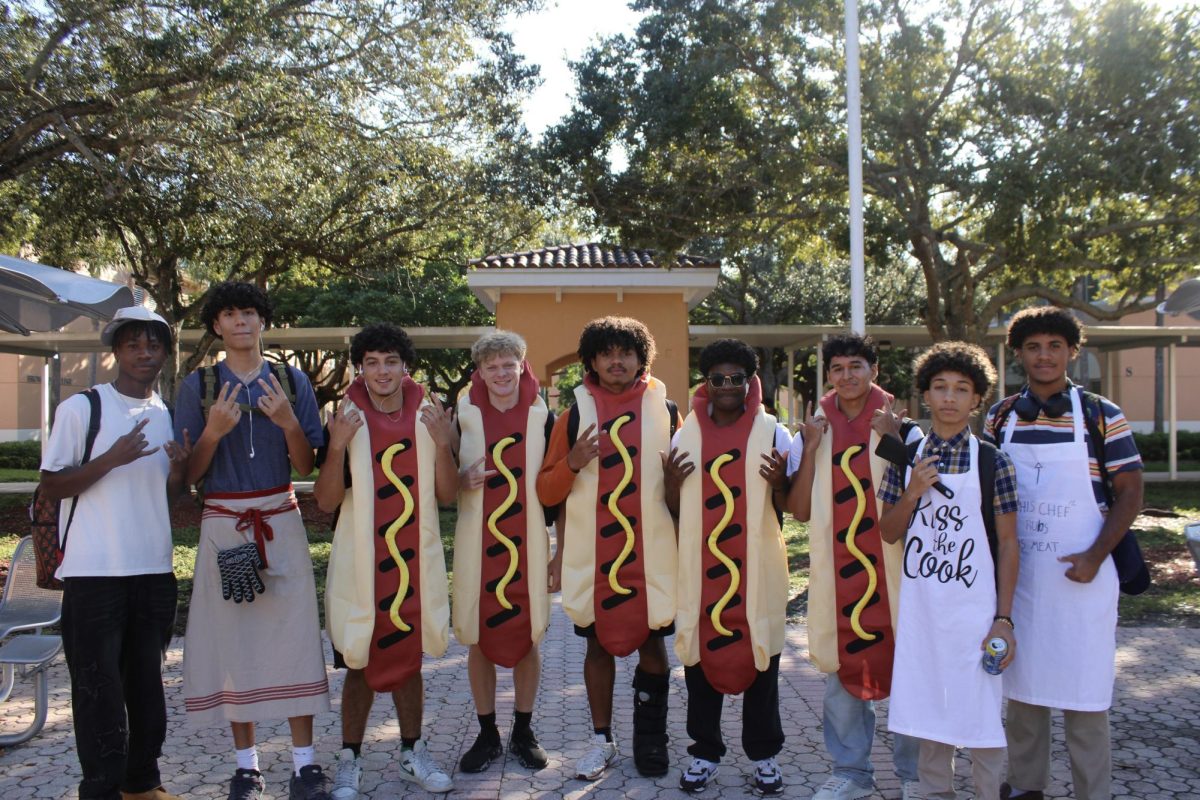 A group of PPCHS students matched as barbecue dads and hot dogs to complete the full cookout look. Creative costumes like this, especially in groups, are what make Spirit Week fun.
