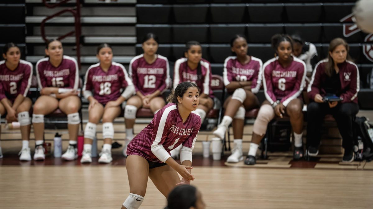 Senior Giana Marte remains ready for the play and communication with her team as she analyzes the other team's way of the game.