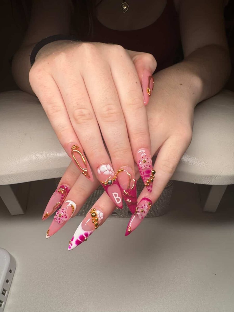 Lily Fornicola made a special design for her friend's nails. It was for Halloween and she wanted pink, funky nails with her boyfriend’s initial on them. 