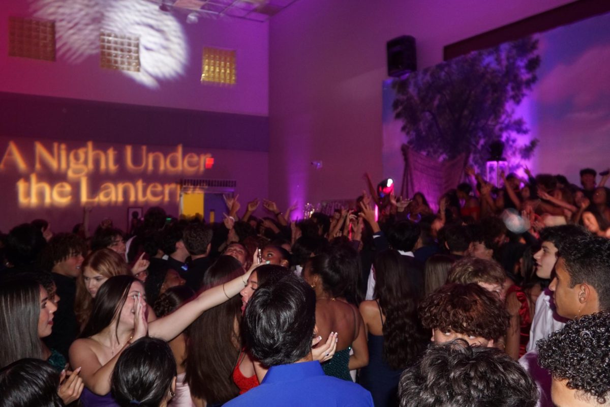 PPCHS students gathered on the dance floor at the 2025 "A Night Under the Lanterns" Homecoming.