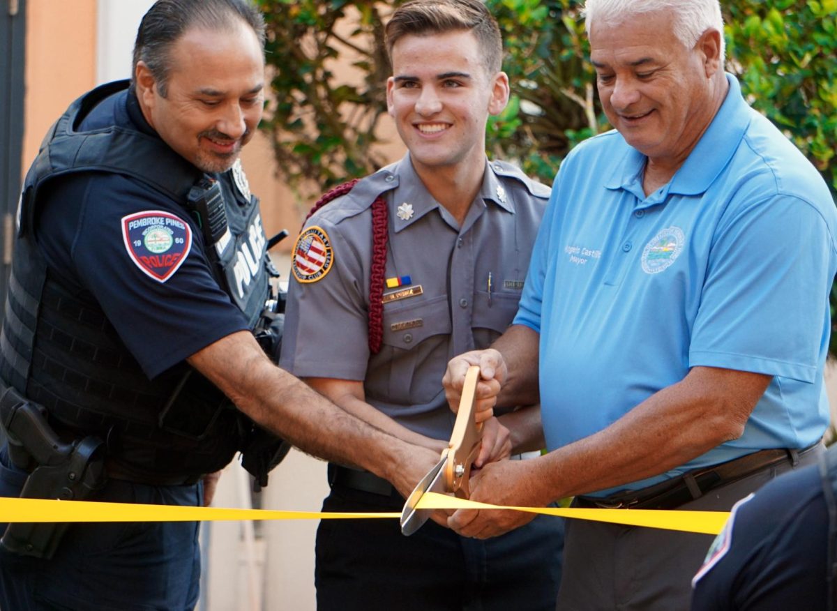 Officer Bucknam, Ryan Perez, and Angelo Castillo cut the ribbon, officially dedicating the garden to veterans and declaring it open to the public. Mayor Angelo Castillo soon after dedicated the Dec. 11th as Veterans Garden Day.