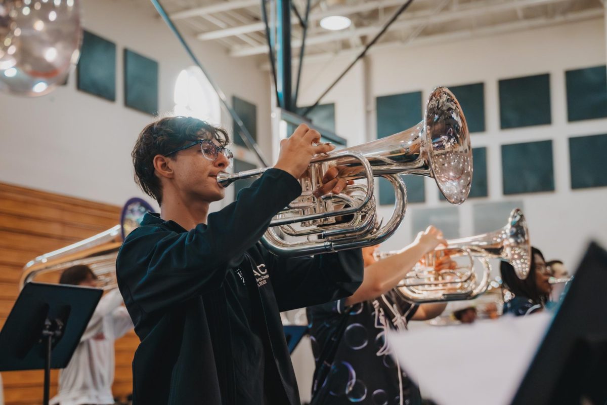 Pembroke Pines Charter High School senior, Aden Carnero playing his natural and skilled instrument: baritone. The story highlights how far people can go when trying to achieve their dreams and fulfilling their futures with passion and color. He plays the instrument high and proud, showing how he's gotten far and will continue to strike for greatness.
