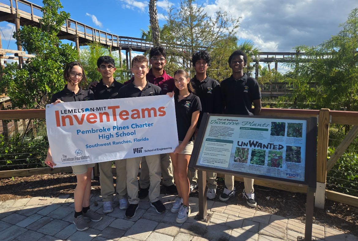 (left to right) Caitlin Estevez, Umer Qureshi, John Abohasen, Steve Jacob, Valentina Glen, Dev Gupta, and Joe Kahura are photographed after being chosen as one of only eight InvenTeams in the country. The group celebrates their work fighting against invasive plant species in the Everglades.