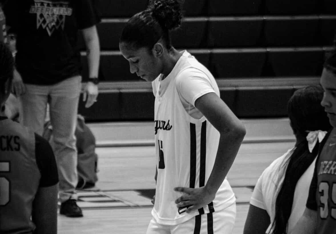Soule Osbourne stands on the court during a Lady Jags Basketball game, thinking about her next move.