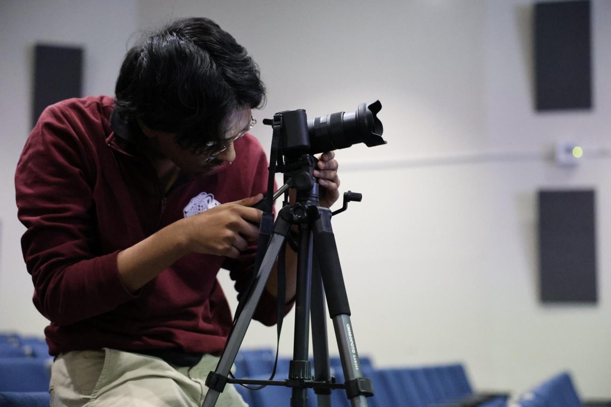 CHAT Video Editor Nikhil Karri prepares to film the DUI presentation. Karri, a senior, is grateful for the opportunity to both participate in and document the event.