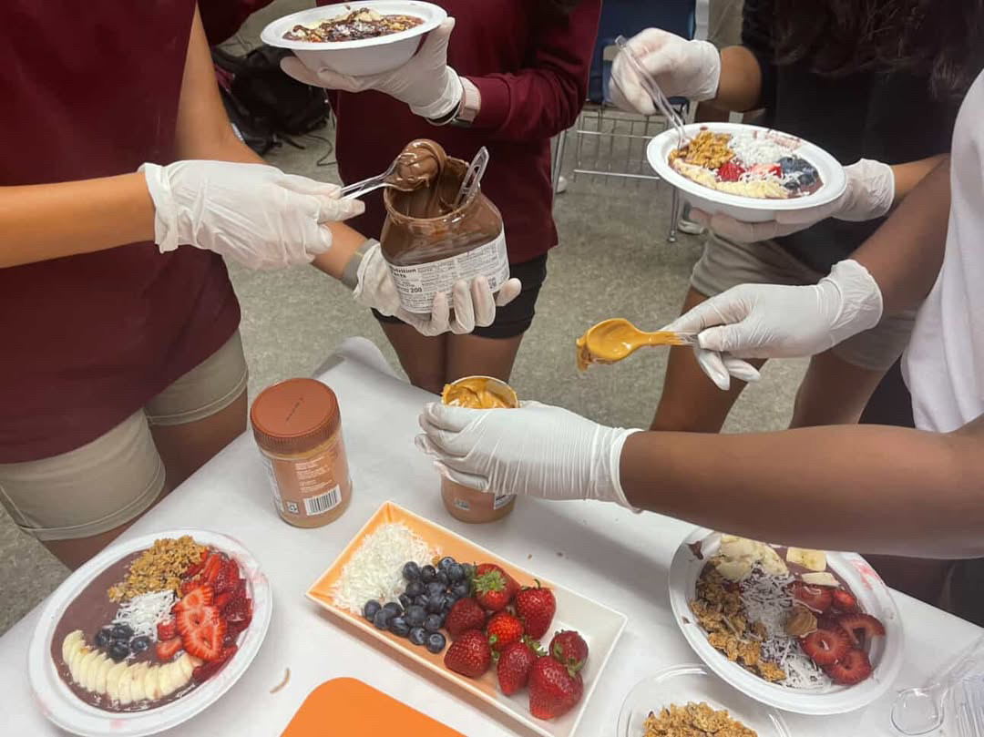 Students create their own acai bowls at PPCHS Culinary Club's meeting.