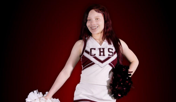 She'riq Elliot in her cheerleader uniform. Since she was eight, cheerleading has been a passion of hers, allowing her to build relationships and work with others.