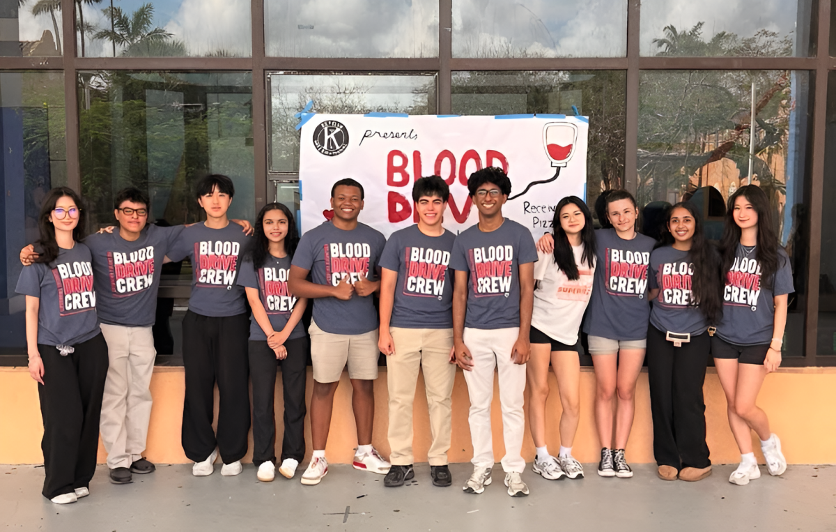 The volunteers of the Key Club Blood Drive stand in front of the ROG, outside the drive.