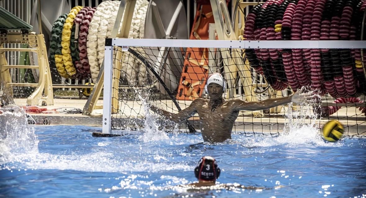 Junior goalkeeper Nicolas Kenol used his whole body to block the ball from going into the goal by jumping.

