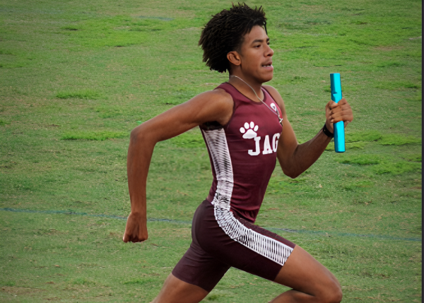 Senior Kameron James racing to the finish line during his last year as a Jaguar. Every stride he takes is with intent. 
