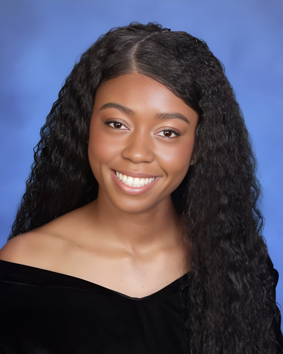 Kameron Dacosta smiles for her senior yearbook photo. 