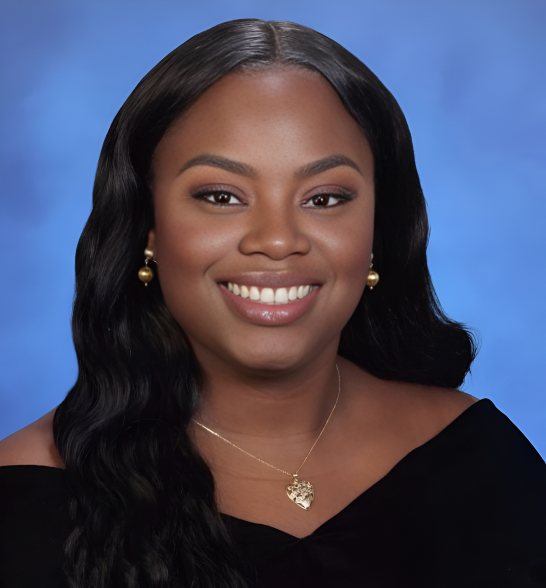 Erioluwa Fatimilehin smiling for her senior photo.