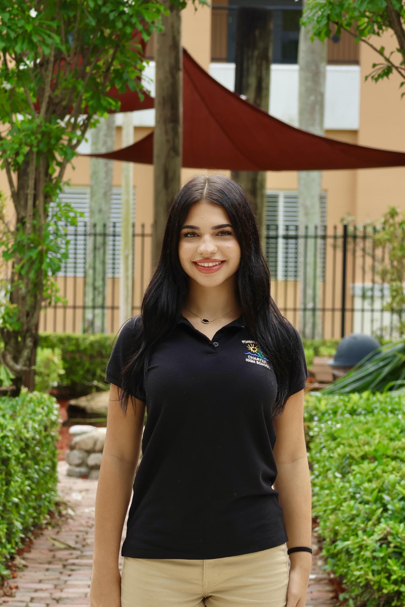 Sophomore Sophia Zernicki smiling at the camera for her CHAT staff picture.