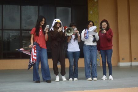 Seniors, one even dressed up as a bald eagle, read the Constitution from their phones. Some hold patriotic accessories, like American flags and pom-poms with the flag's colors.
Photo by <a href="https://ppchsnews.com/staff_profile/paige-hennequin/">Paige Hennequin</a>